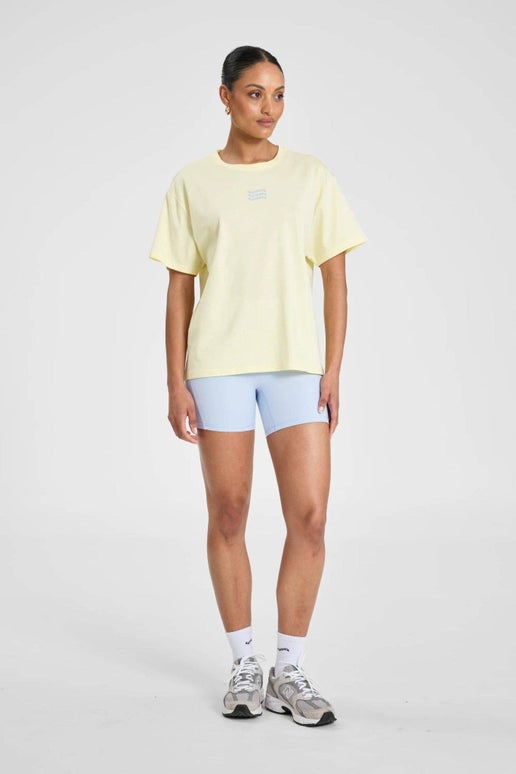 ALLFENIX Waves Logo Tee: Butter Yellow